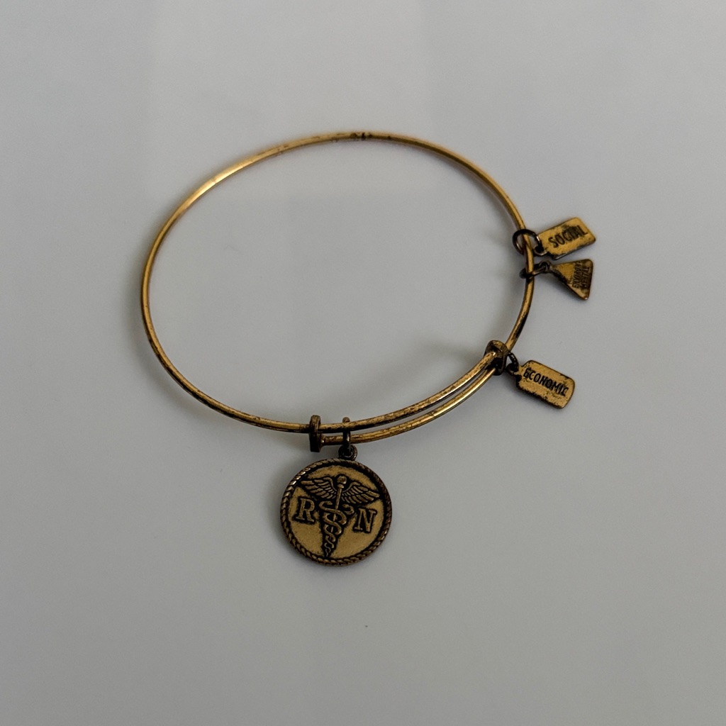 Alex And Ani Gold Rn Charm Bracelet 7$